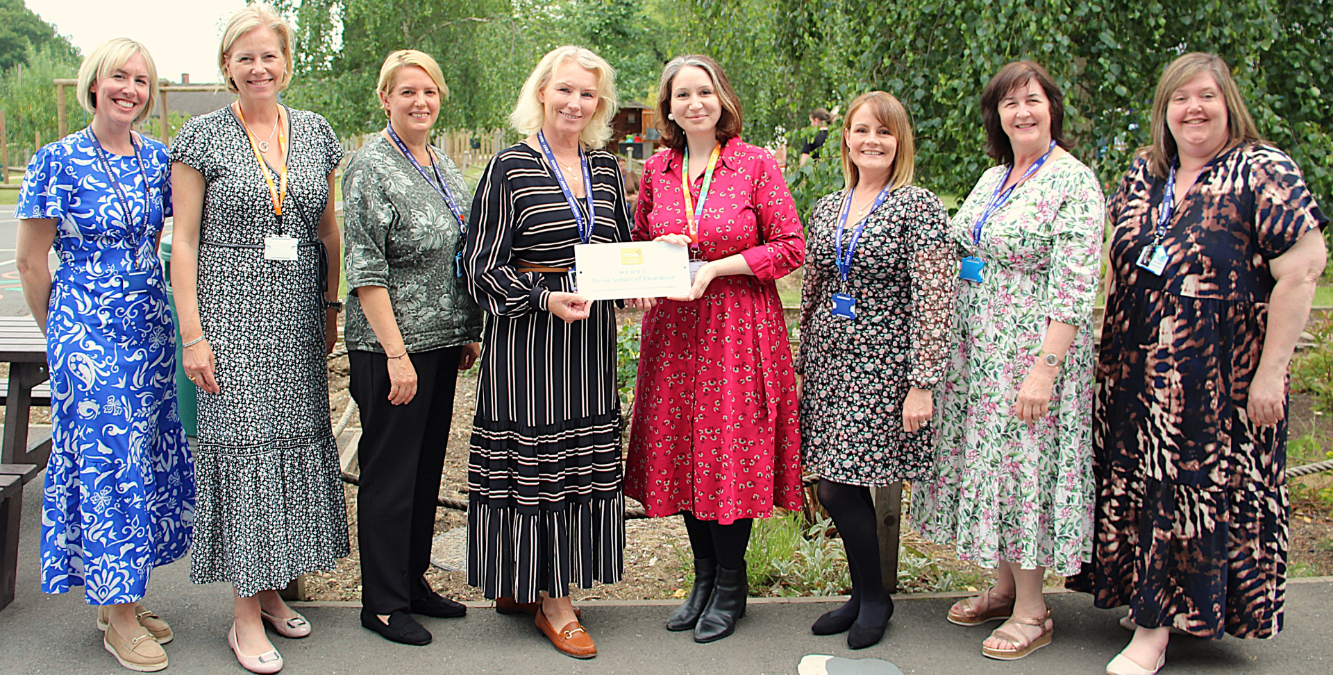 Staff at Drapers' Maylands Primary School receiving their Thrive School of Excellence Award